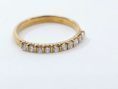HALF-ALLIANCE in 750° yellow gold set with...