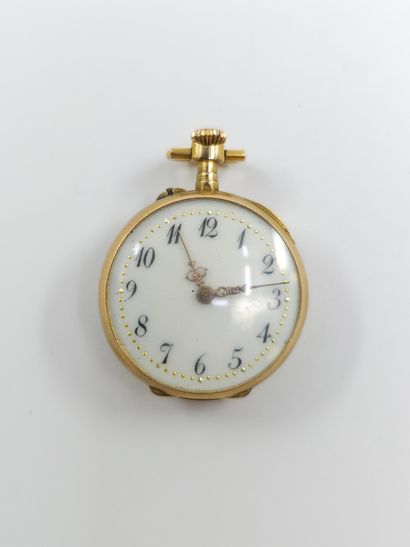 MONTRE de col en or jaune 750°, le dos ornée...