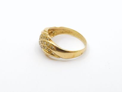 RING in 750° yellow gold set with thirty-five...