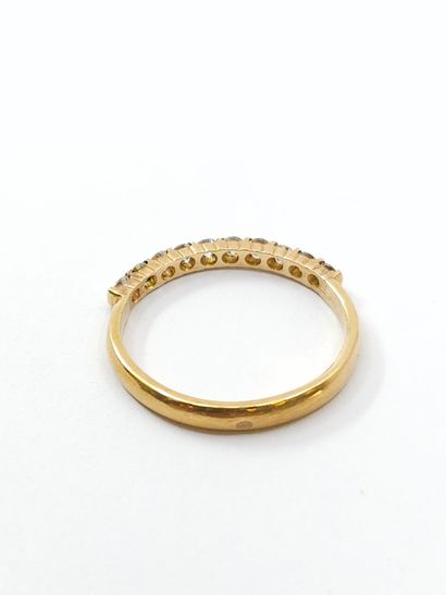 HALF-ALLIANCE in 750° yellow gold set with...