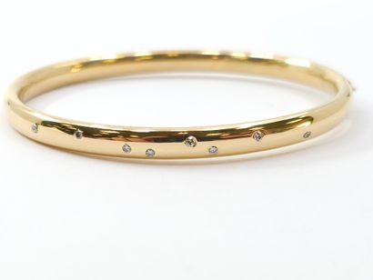 750° yellow gold opening band BRACELET studded...