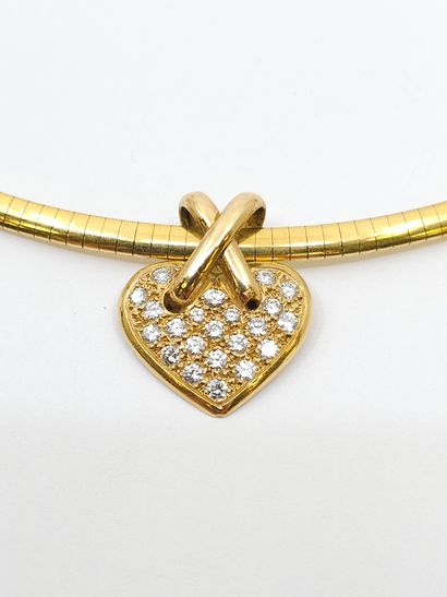 COLLAR in 750° yellow gold with a heart pendant...