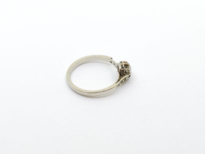 RING in 750° white gold set with an old-cut...