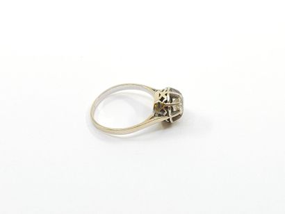 DEMI PARURE en or gris 750° ornée de diamant
Bague...