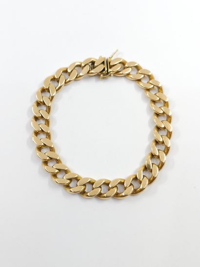 BRACELET maille gourmette en or jaune 750°...