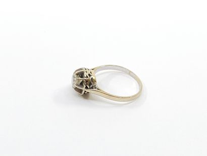 DEMI PARURE en or gris 750° ornée de diamant
Bague...