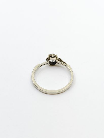 RING in 750° white gold set with an old-cut...