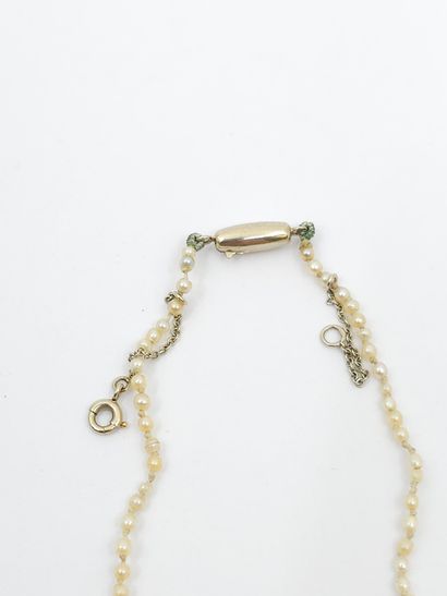 NECKLACE of probably fine pearls, ratchet...