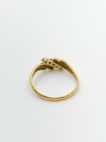 RING in 750° yellow gold set with five diamonds
Gross...