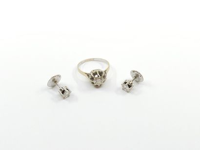 DEMI PARURE en or gris 750° ornée de diamant
Bague...