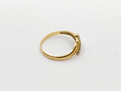 RING in 750° yellow gold set with five diamonds
Gross...