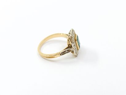 RING in two-tone 750° gold set with a close-set...