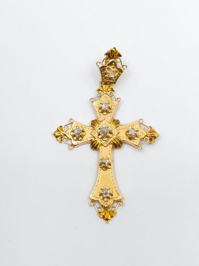 FRENCH WORK 
Cross in 750° yellow gold set...