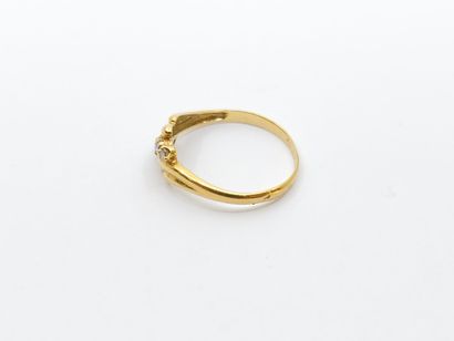 RING in 750° yellow gold set with five diamonds
Gross...
