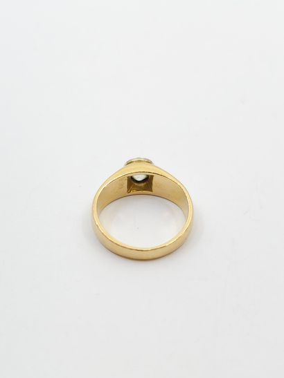 RING in two-tone 750° gold set with an old-cut...