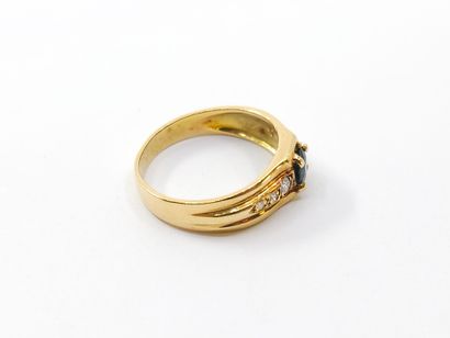 RING in yellow 750° set with a sapphire and...