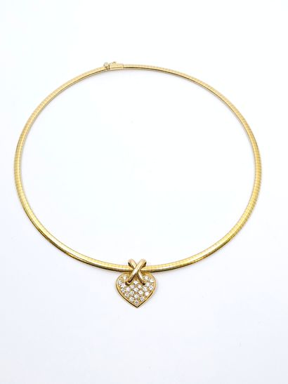 COLLAR in 750° yellow gold with a heart pendant...