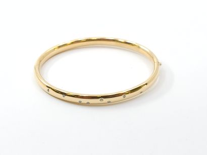 750° yellow gold opening band BRACELET studded...