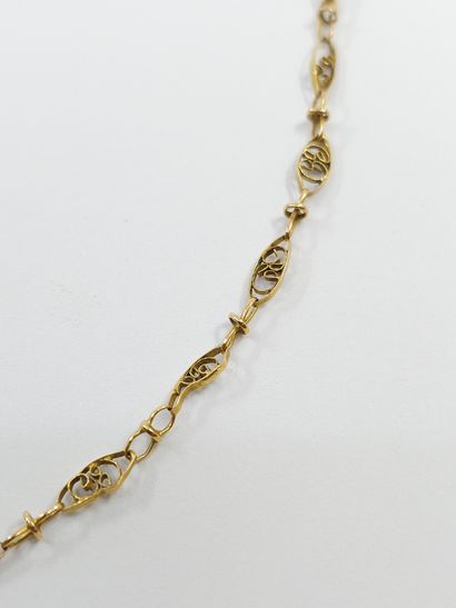 COLLIER en or jaune 750° à maille ajourée...