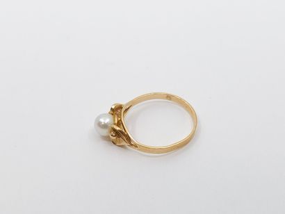 BAGUE de jeune fille en or jaune 750° ornée...