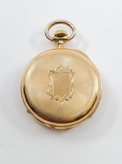 MONTRE de col en or jaune 750°, cadran rond,...
