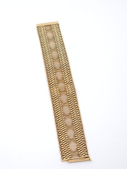 BRACELET MANCHETTE ajouré en or jaune 750°
Poids...