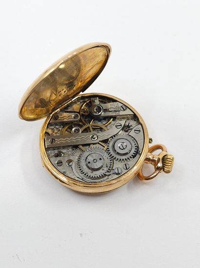 MONTRE de col en or jaune 750°, cadran rond,...
