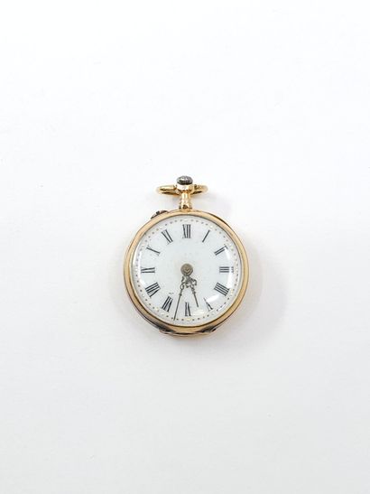 MONTRE de col en or jaune 750°, cadran rond,...