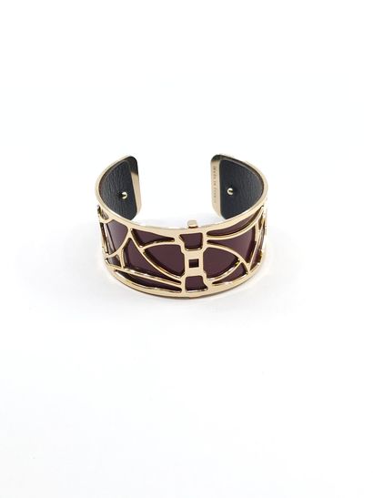 LES GEORGETTES 
Bracelet en metal dore et...
