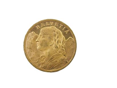 PIECE de 20 francs suisse en or 
Poids :...