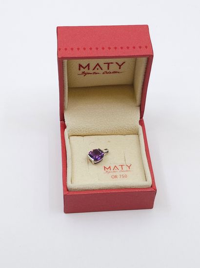 PENDENTIF en or gris 750° orné d'une améthyste...