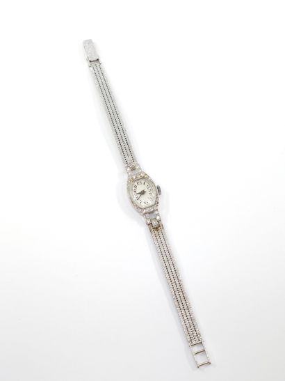 TRAVAIL ART DECO 
Montre bracelet en or gris...