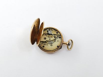 MONTRE de col en or jaune 750°, cadran rond,...