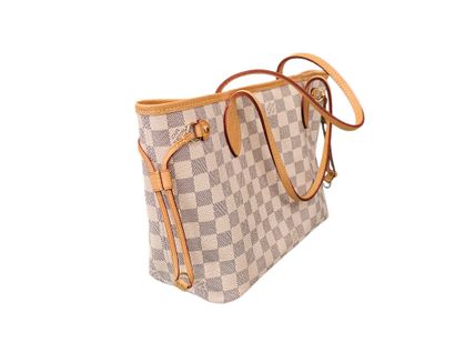 LOUIS VUITTON
Sac Neverfull en toile enduite...