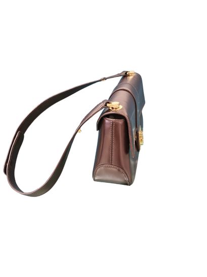 SALVATORE FERRAGAMO
Sac baguette en cuir...