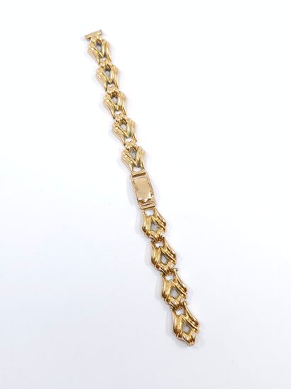 DÉBRIS de bracelet de montre en or jaune...