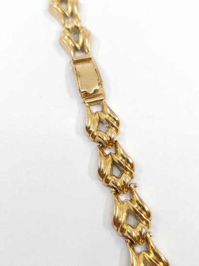 DÉBRIS de bracelet de montre en or jaune...