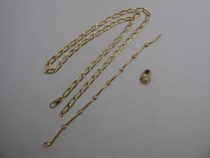 1 Broche Or 18kt et pierres 2,56 g 1 Chaine...