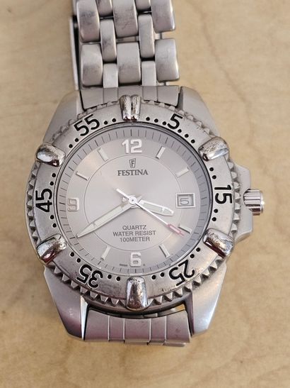 FESTINA
Metal quartz diver's watch, round...