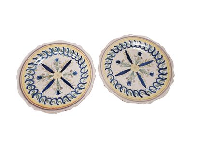 SET OF SIX earthenware plates decorated with...