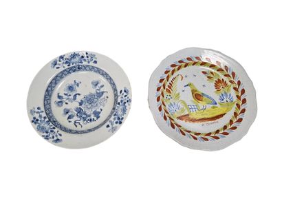 SET OF SIX earthenware plates decorated with...
