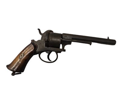 Travail belge
Le faucheux
Revolver à broche
En...