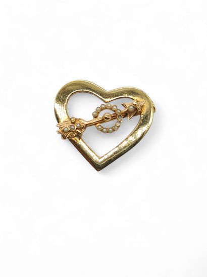 Heart brooch pierced with an arrow in 750°...