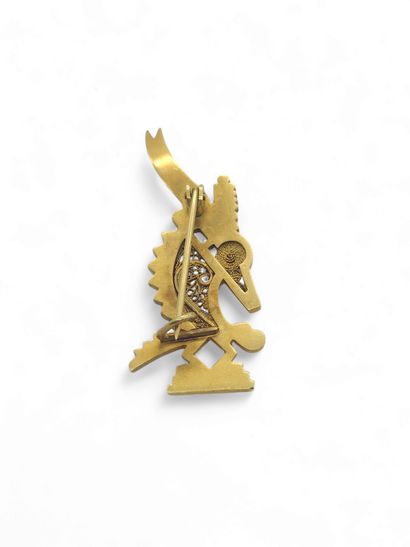 African WORK
BROCHURE in yellow gold 
weight...