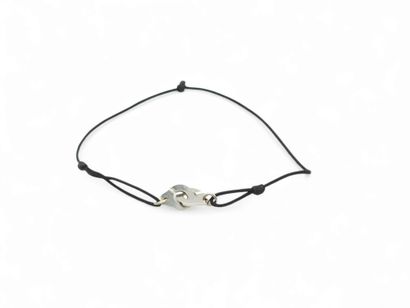 DINH VAN 
Bracelet menottes en or gris 750°...