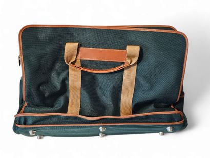 LANCEL
Travel bag in bottle green canvas...