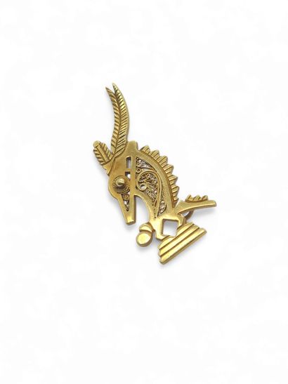 African WORK
BROCHURE in yellow gold 
weight...