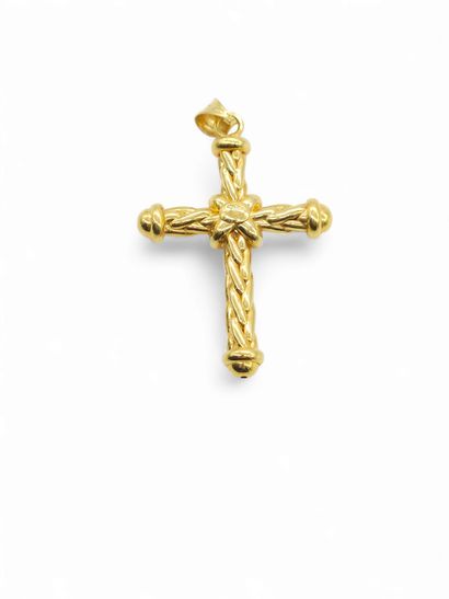 Cross-shaped pendant in 750° yellow gold
Weight...