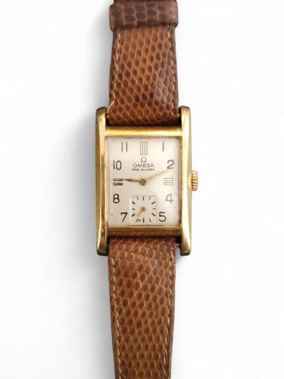 OMEGA 
Wristwatch in 750° yellow gold, rectangular...