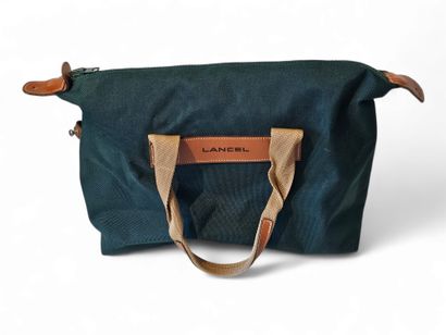 LANCEL
Travel bag in bottle green canvas...